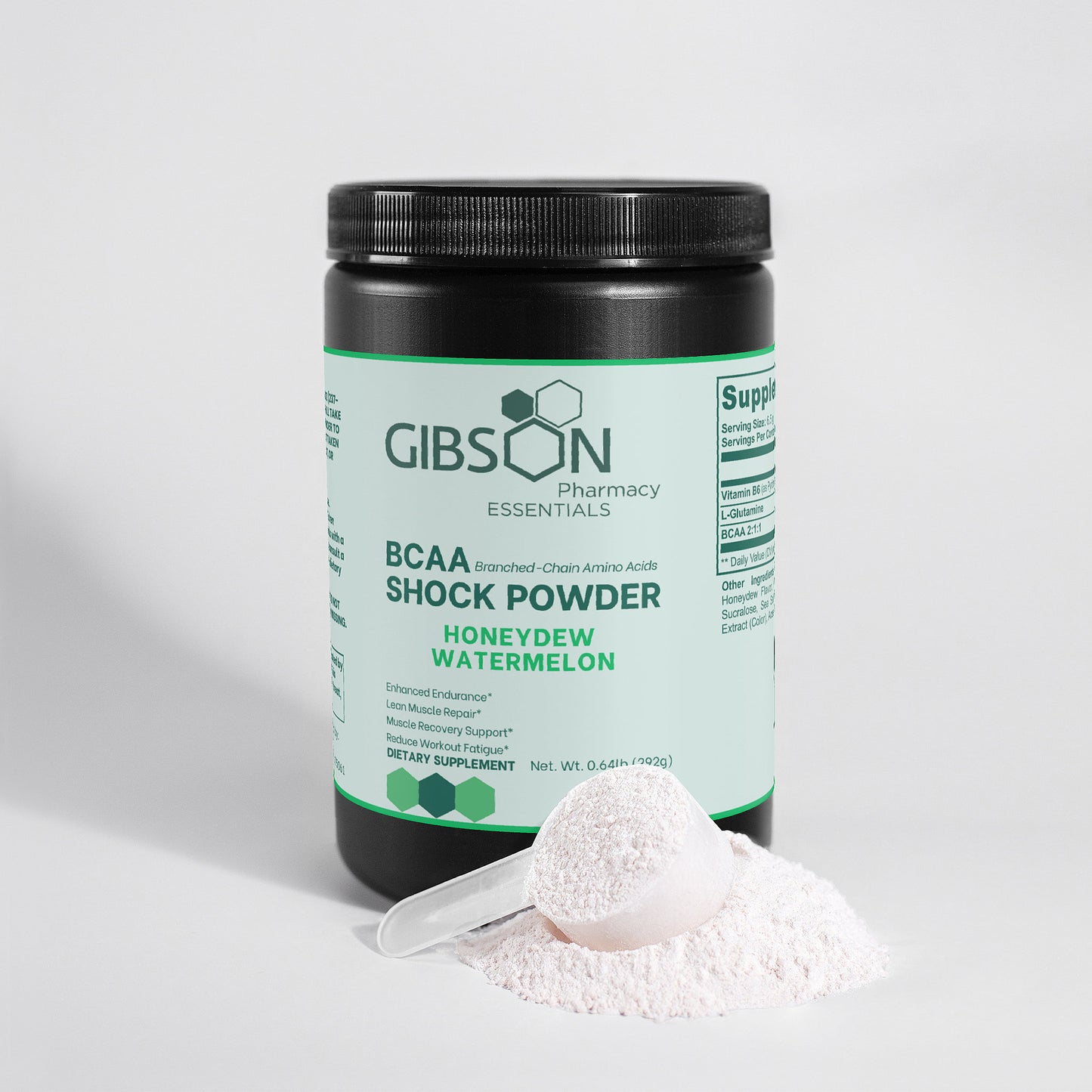 Gibson Pharmacy Essentials BCAA Shock Powder container with scoop and powder on a light gray background