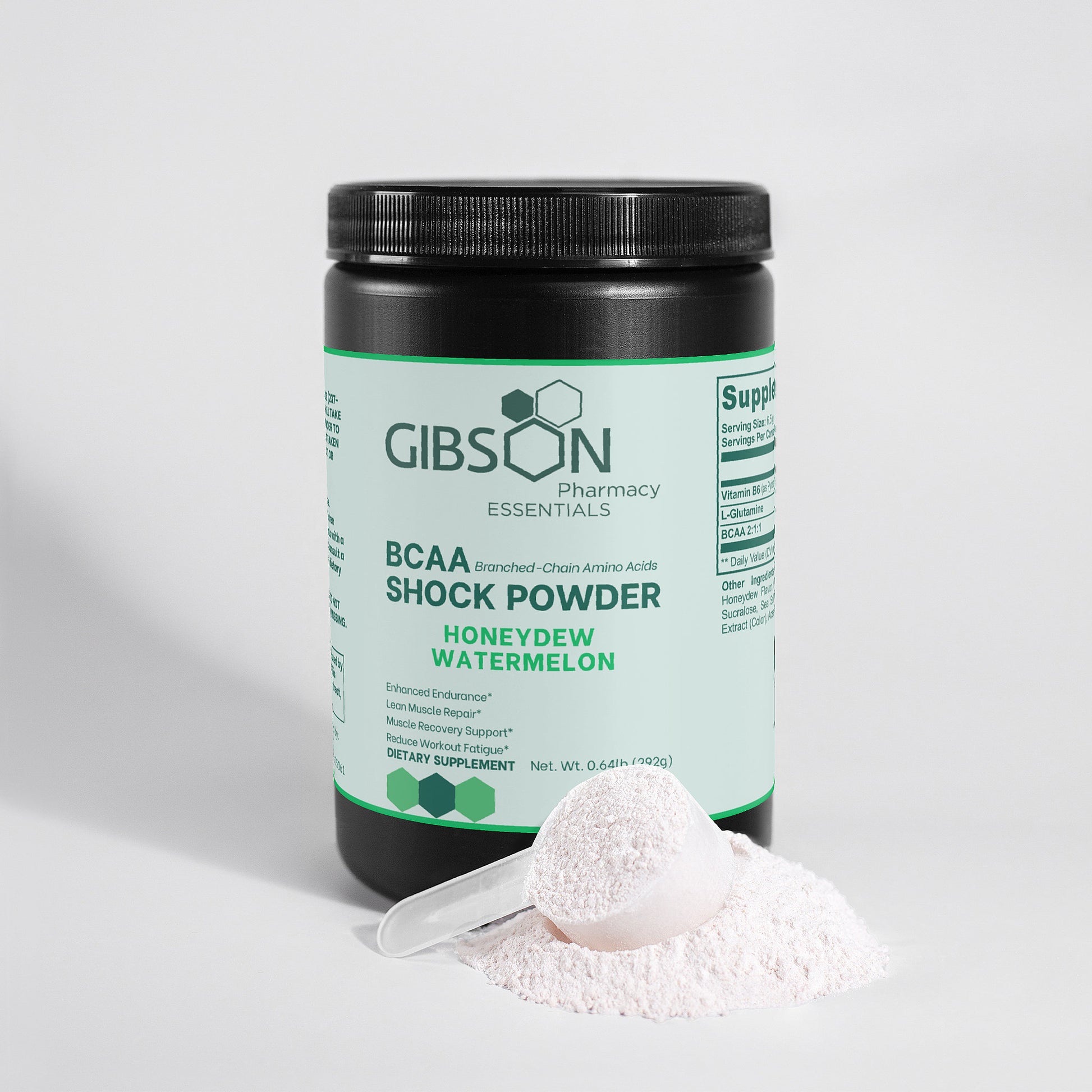 Gibson Pharmacy Essentials BCAA Shock Powder container with scoop and powder on a light gray background